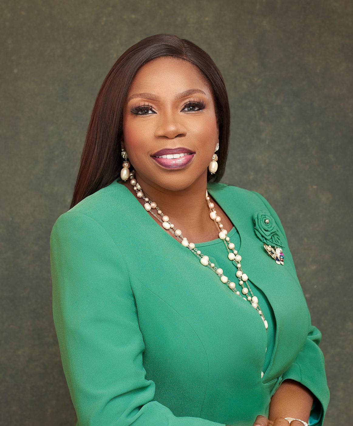 Dr. Janet Adetu speaking on stage