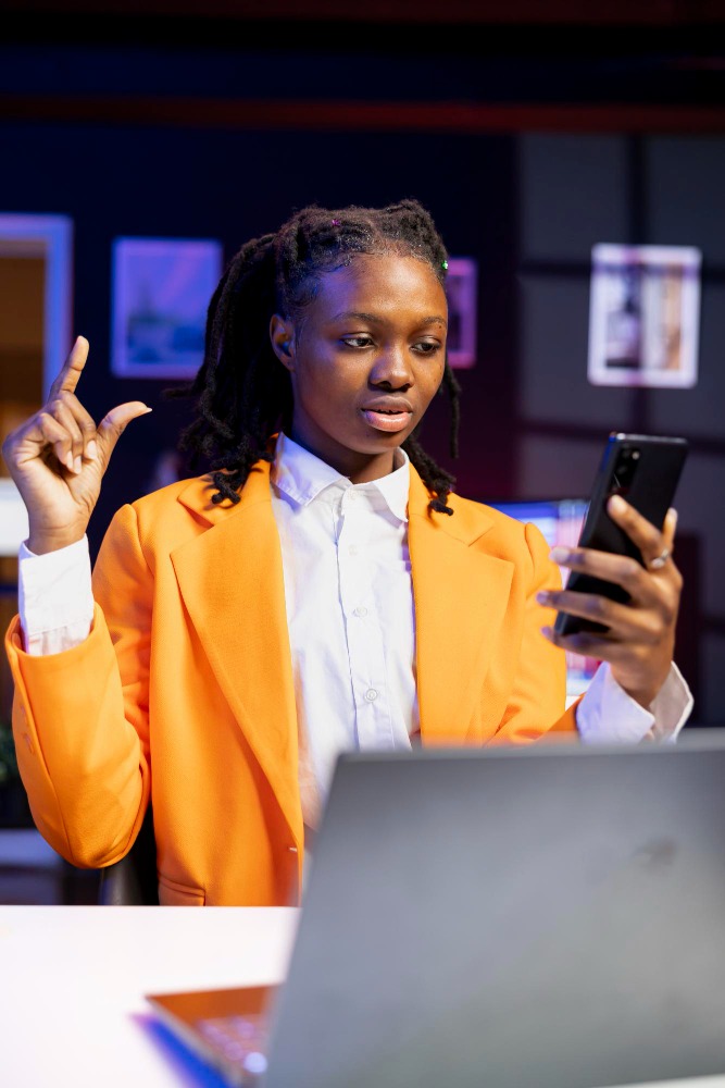 A professional checking a message on her phone